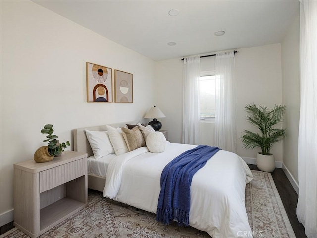 5512 W 117th St, Hawthorne, CA 90304 - bedroom featuring baseboards and wood finished floors