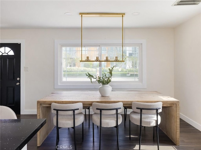 5512 W 117th St, Hawthorne, CA 90304 - dining room featuring baseboards and wood finished floors