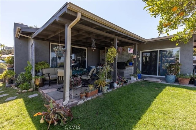 6096 Crawford St, San Diego, CA 92120 - back of house featuring stucco siding, a lawn, and a patio area