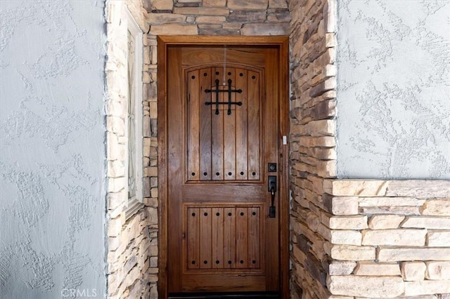 6096 Crawford St, San Diego, CA 92120 - doorway to property with stone siding