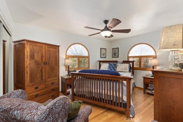 6096 Crawford St, San Diego, CA 92120 - bedroom featuring multiple windows, light wood finished floors, and a ceiling fan