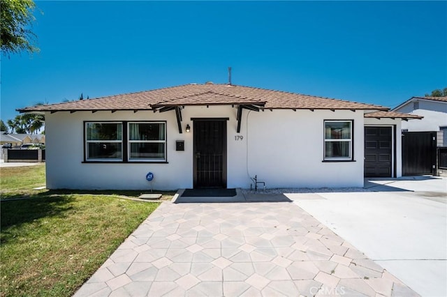 179 N Rodecker Dr, Azusa, CA 91702 - view of front of home featuring stucco siding and a front yard