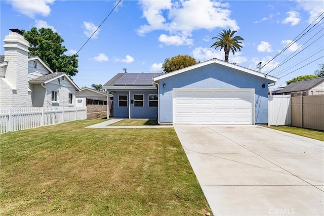114 N Orange Ave, Fullerton, CA 92833 - view of front of home featuring solar panels, driveway, an attached garage, and stucco siding
