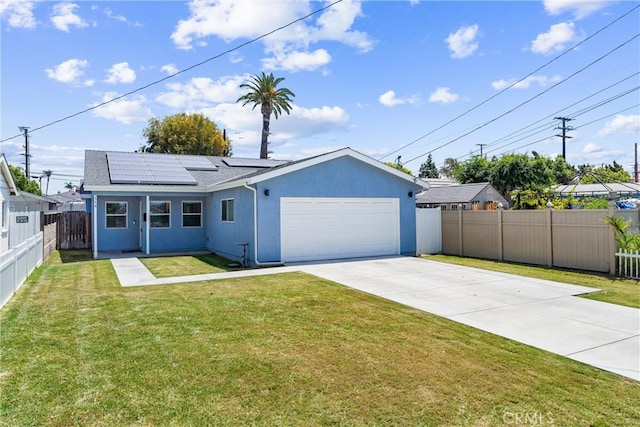 114 N Orange Ave, Fullerton, CA 92833 - back of house featuring an attached garage, driveway, roof mounted solar panels, and stucco siding