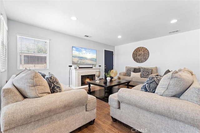 114 N Orange Ave, Fullerton, CA 92833 - living room with dark wood-style floors, recessed lighting, and a glass covered fireplace