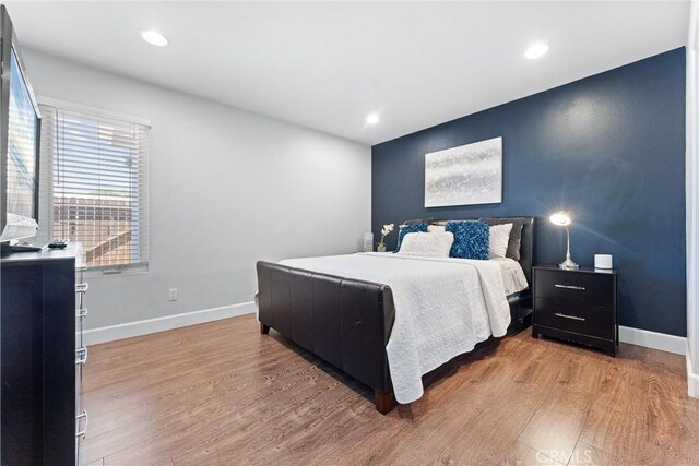 114 N Orange Ave, Fullerton, CA 92833 - bedroom featuring light wood finished floors, baseboards, and recessed lighting