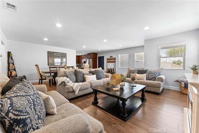 114 N Orange Ave, Fullerton, CA 92833 - living room with recessed lighting, wood finished floors, and baseboards
