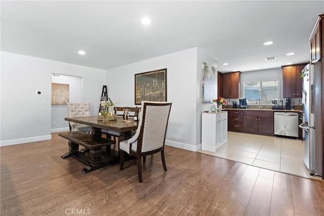 114 N Orange Ave, Fullerton, CA 92833 - dining space with baseboards, light wood-type flooring, and recessed lighting