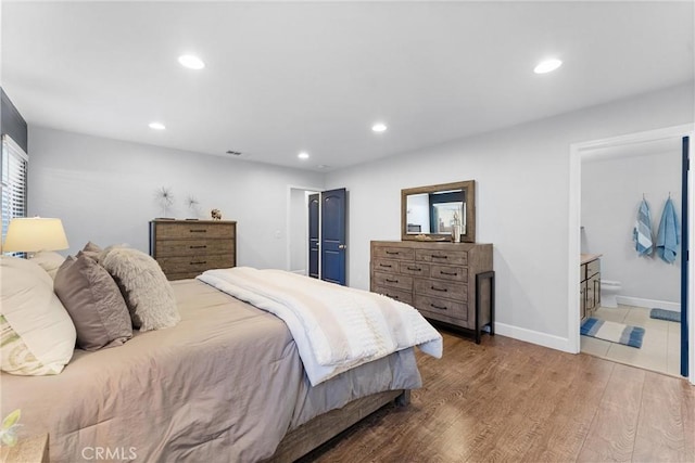 114 N Orange Ave, Fullerton, CA 92833 - bedroom featuring recessed lighting, wood finished floors, baseboards, and ensuite bathroom