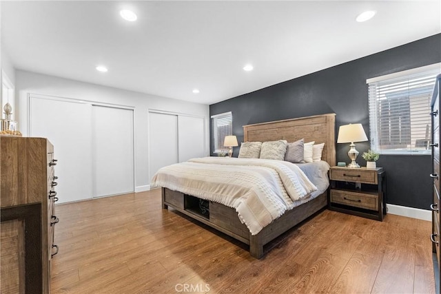114 N Orange Ave, Fullerton, CA 92833 - bedroom featuring two closets, wood finished floors, and recessed lighting