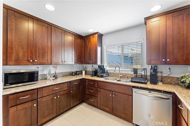 114 N Orange Ave, Fullerton, CA 92833 - kitchen with appliances with stainless steel finishes, a sink, recessed lighting, light tile patterned floors, and light stone counters
