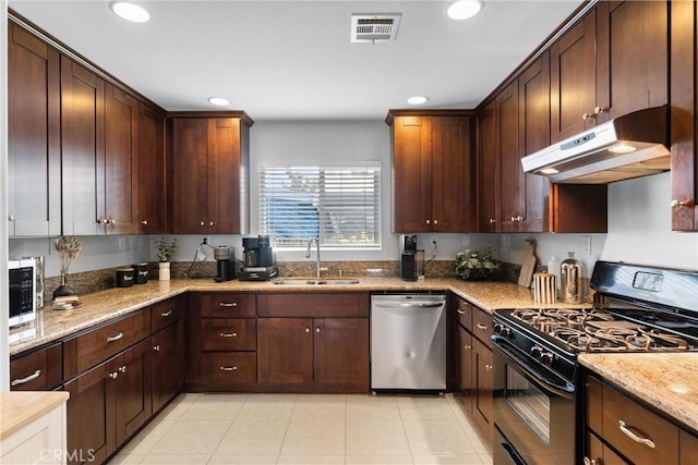114 N Orange Ave, Fullerton, CA 92833 - kitchen with black gas range, dishwasher, a sink, under cabinet range hood, and recessed lighting