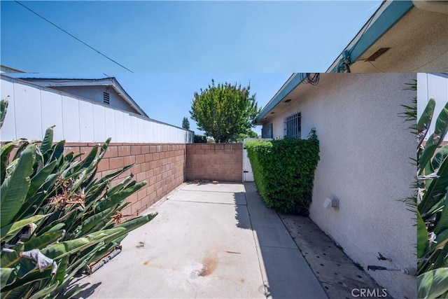 16751 Ludlow St, Granada Hills, CA 91344 - fenced backyard with a patio