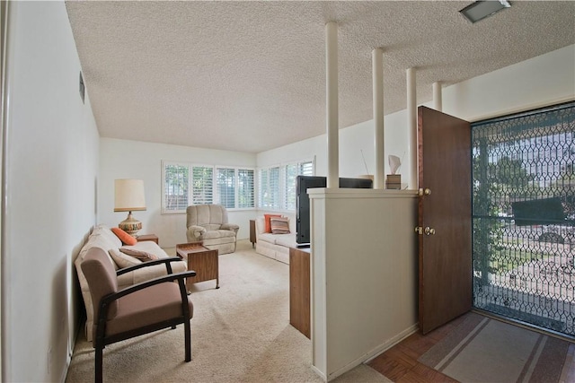 16751 Ludlow St, Granada Hills, CA 91344 - carpeted living area with a textured ceiling