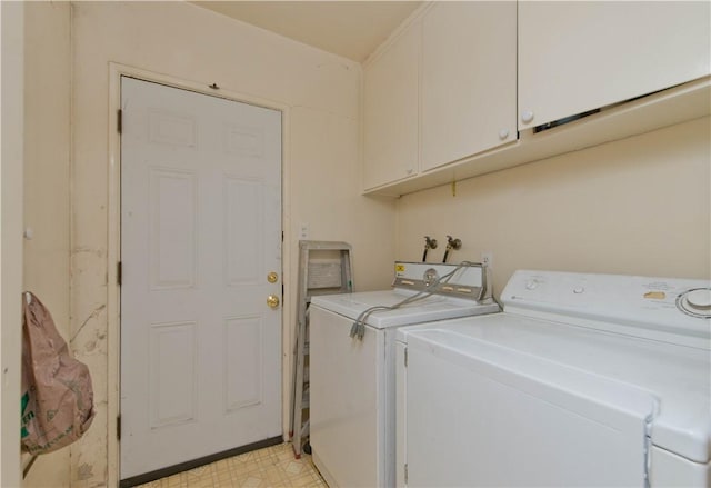 16751 Ludlow St, Granada Hills, CA 91344 - laundry area with cabinet space, washer and clothes dryer, and light floors