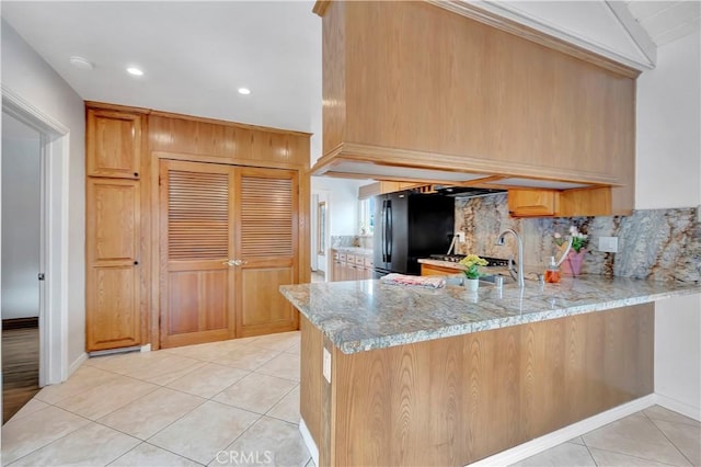 786 S Spanish Oak Ln, La Puente, CA 91746 - kitchen featuring backsplash, light tile patterned floors, light stone countertops, and recessed lighting