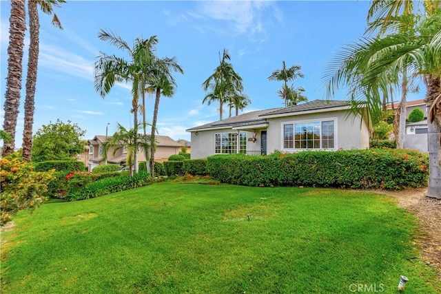 786 S Spanish Oak Ln, La Puente, CA 91746 - view of front of house with stucco siding and a front lawn