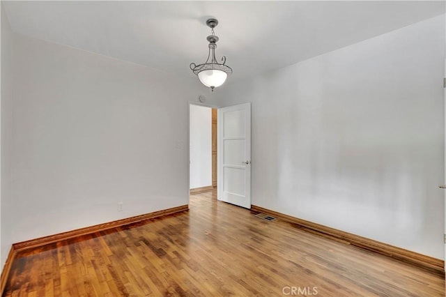 786 S Spanish Oak Ln, La Puente, CA 91746 - unfurnished room featuring wood finished floors and baseboards