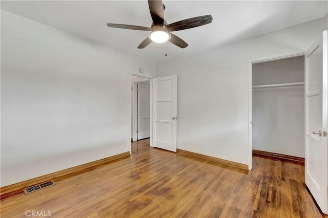 786 S Spanish Oak Ln, La Puente, CA 91746 - unfurnished bedroom with a closet, wood finished floors, baseboards, and a ceiling fan