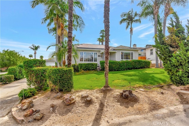 786 S Spanish Oak Ln, La Puente, CA 91746 - view of front of property with stucco siding and a front lawn