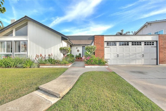 4326 Via Verde, Cypress, CA 90630 - view of front of property with a garage, a front yard, and concrete driveway