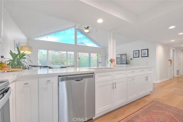 4326 Via Verde, Cypress, CA 90630 - kitchen featuring appliances with stainless steel finishes, light wood-style floors, white cabinetry, light countertops, and recessed lighting