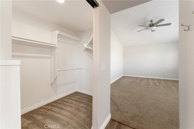 5809 Almond Valley Way, Lancaster, CA 93536 - spacious closet with a ceiling fan, carpet, and lofted ceiling