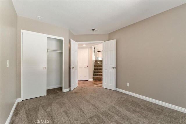 5809 Almond Valley Way, Lancaster, CA 93536 - unfurnished bedroom featuring carpet, baseboards, and a closet