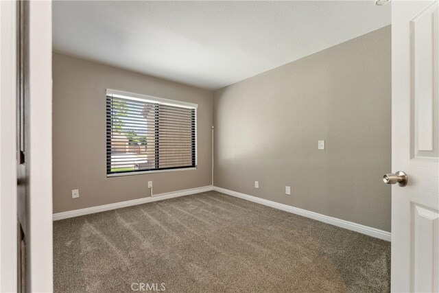 5809 Almond Valley Way, Lancaster, CA 93536 - unfurnished room with carpet floors and baseboards