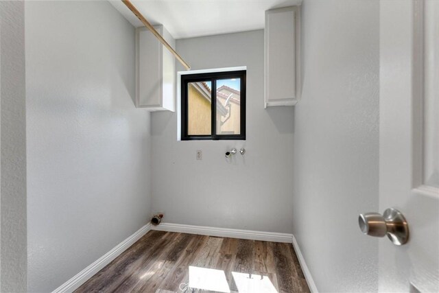 5809 Almond Valley Way, Lancaster, CA 93536 - washroom featuring wood finished floors and baseboards