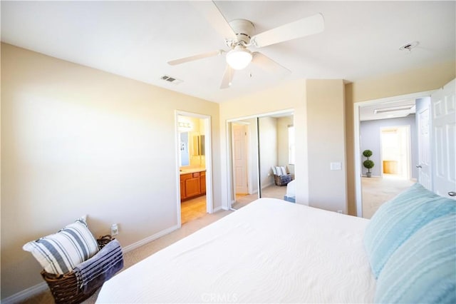 31786 Sorrel Run Ct, Menifee, CA 92584 - bedroom featuring light colored carpet, baseboards, a closet, ceiling fan, and ensuite bathroom