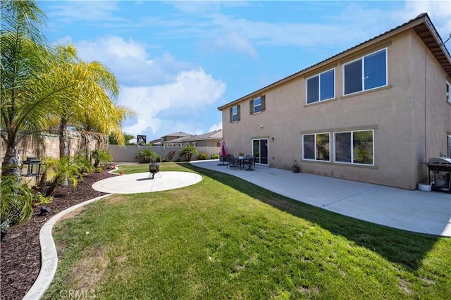 31786 Sorrel Run Ct, Menifee, CA 92584 - back of house featuring stucco siding and a patio
