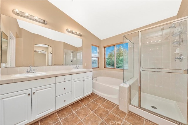 44224 Raven Ln, Lancaster, CA 93536 - bathroom with a shower stall, lofted ceiling, a bath, and double vanity