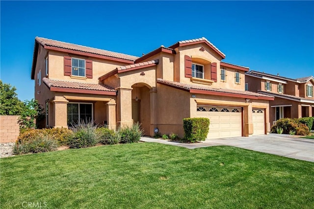 44224 Raven Ln, Lancaster, CA 93536 - mediterranean / spanish-style home featuring driveway, an attached garage, a tiled roof, stucco siding, and a front lawn