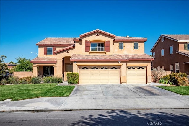 44224 Raven Ln, Lancaster, CA 93536 - mediterranean / spanish-style house featuring an attached garage, stucco siding, concrete driveway, and a tile roof