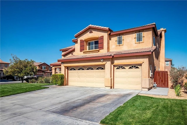 44224 Raven Ln, Lancaster, CA 93536 - mediterranean / spanish-style house featuring an attached garage, concrete driveway, stucco siding, a tiled roof, and a front yard