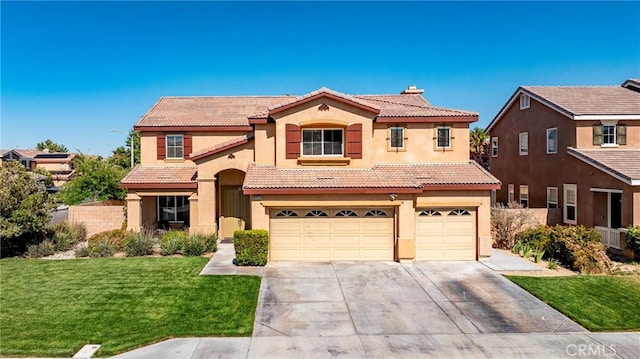 44224 Raven Ln, Lancaster, CA 93536 - mediterranean / spanish house with an attached garage, stucco siding, concrete driveway, a tile roof, and a front yard