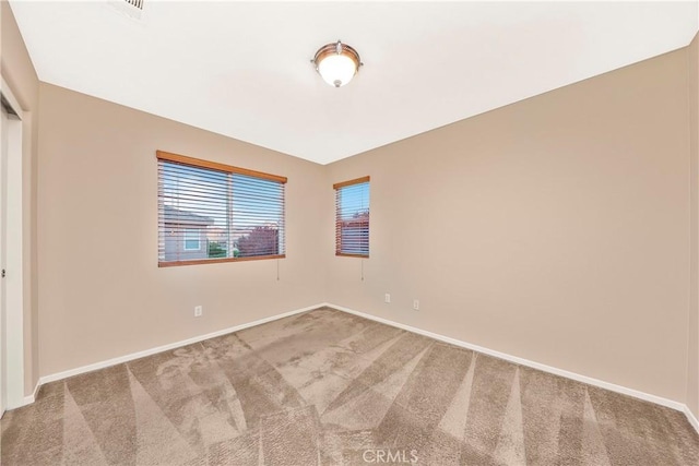 44224 Raven Ln, Lancaster, CA 93536 - carpeted spare room featuring baseboards