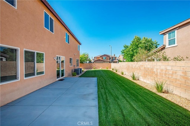 44224 Raven Ln, Lancaster, CA 93536 - view of yard featuring central air condition unit and a patio area
