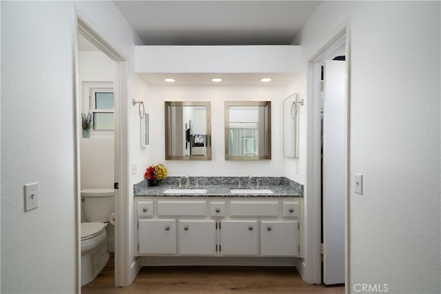 36 Via Lavendera, Rancho Santa Margarita, CA 92688 - full bath featuring double vanity, toilet, wood finished floors, and recessed lighting