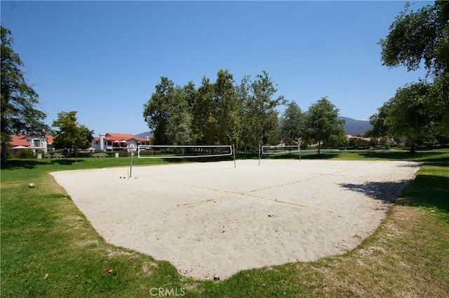 36 Via Lavendera, Rancho Santa Margarita, CA 92688 - view of home's community featuring volleyball court, a lawn, and a mountain view