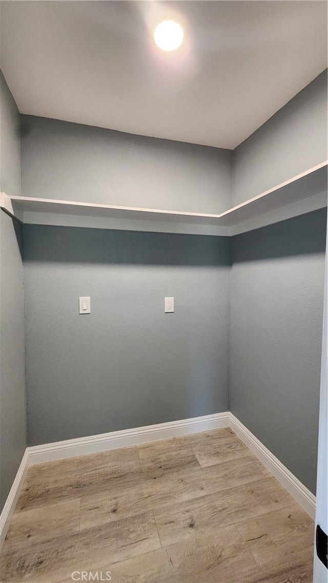 2045 S Cypress Ave, Ontario, CA 91762 - walk in closet with wood finished floors
