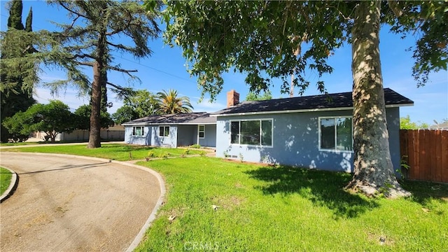 2045 S Cypress Ave, Ontario, CA 91762 - ranch-style home featuring stucco siding and a chimney