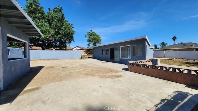 2045 S Cypress Ave, Ontario, CA 91762 - back of house with a patio area and stucco siding