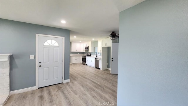 2045 S Cypress Ave, Ontario, CA 91762 - foyer featuring a ceiling fan, baseboards, light wood-style floors, and recessed lighting