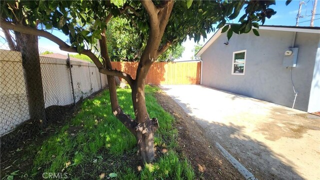 2045 S Cypress Ave, Ontario, CA 91762 - fenced backyard with a patio area
