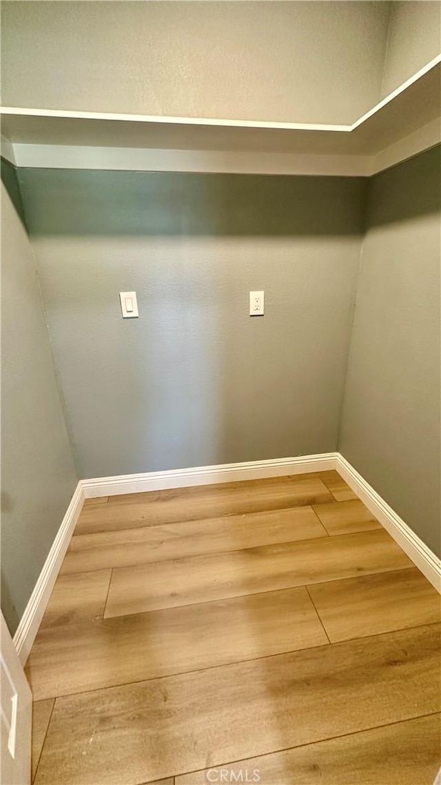 2045 S Cypress Ave, Ontario, CA 91762 - washroom featuring wood finished floors and baseboards
