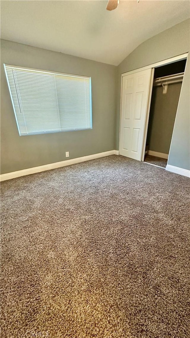2045 S Cypress Ave, Ontario, CA 91762 - unfurnished bedroom with vaulted ceiling, a closet, a ceiling fan, and carpet flooring