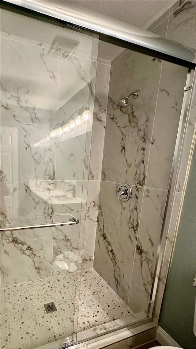 2045 S Cypress Ave, Ontario, CA 91762 - full bathroom featuring a marble finish shower and toilet