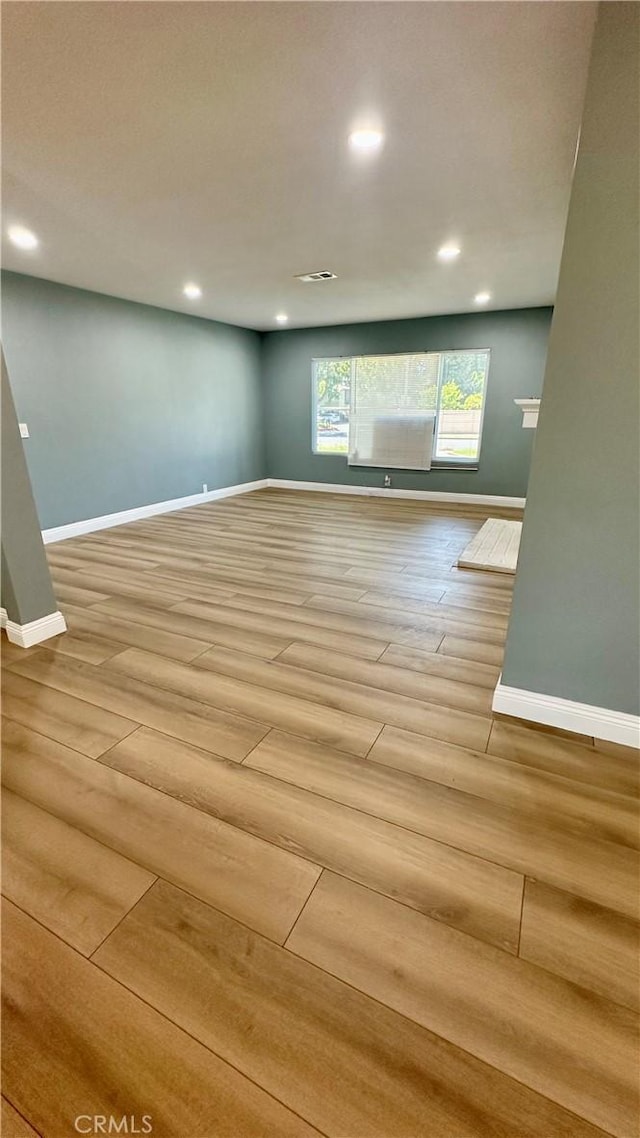 2045 S Cypress Ave, Ontario, CA 91762 - spare room featuring light wood finished floors and recessed lighting